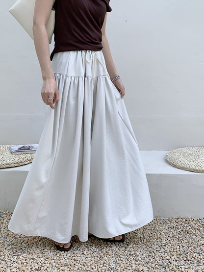 RISE HIGH WAIST TROUSERS IN BEIGE