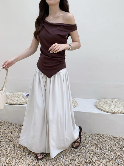 RISE HIGH WAIST TROUSERS IN BEIGE