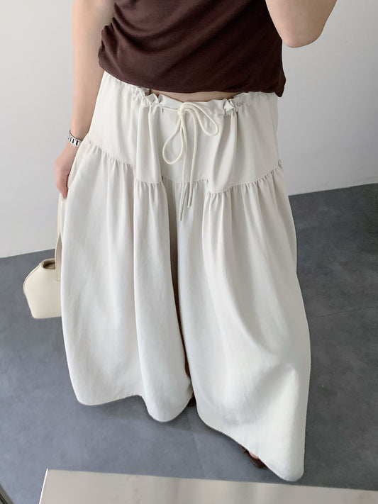 RISE HIGH WAIST TROUSERS IN BEIGE