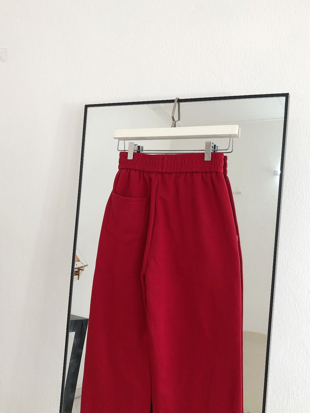 RED TROUSERS